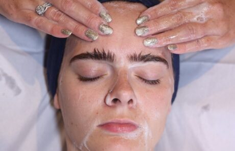 Client enjoying a HydraRefresh facial at SKIN lounge Aesthetics Richmond Hill, a cutting-edge treatment combining deep cleansing, exfoliation, and hydration technology to rejuvenate the skin, boost collagen, and enhance natural radiance.