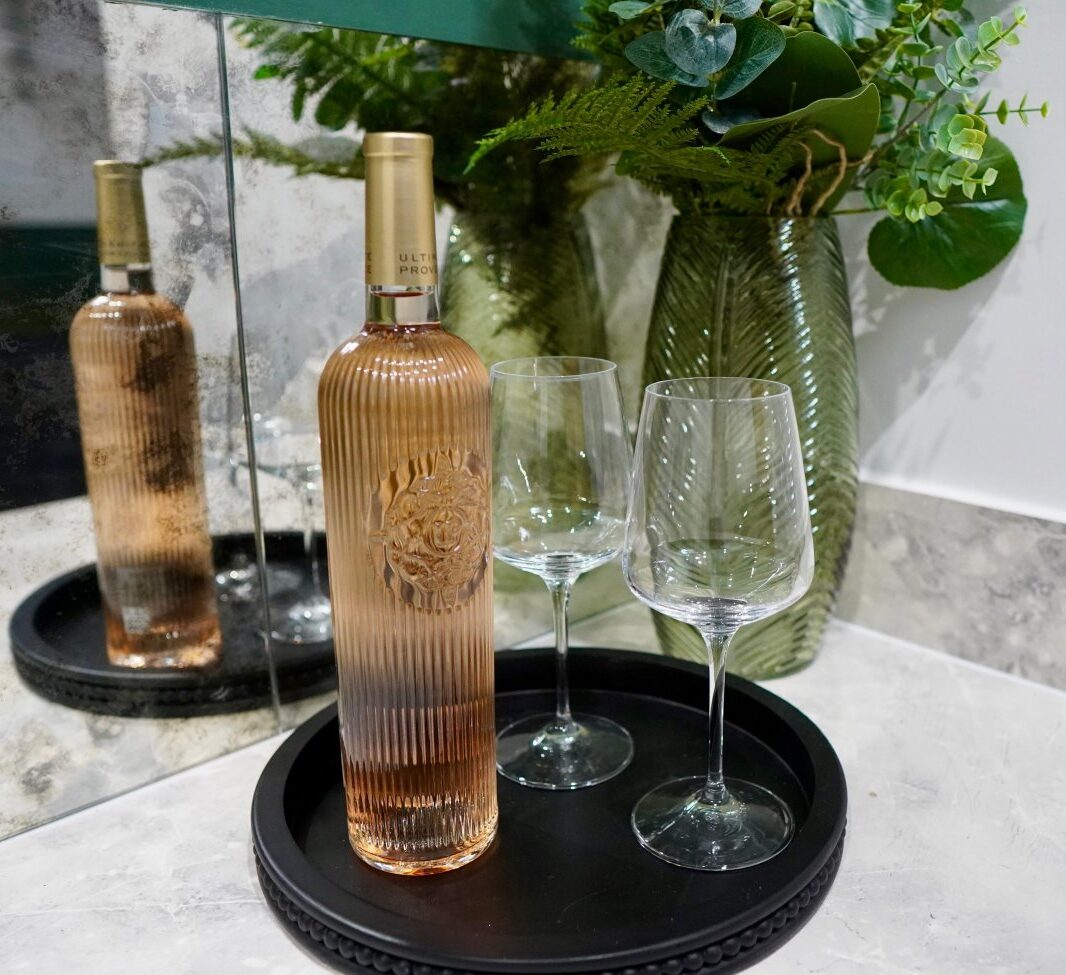 Elegant bar area at SKIN lounge Aesthetics Richmond Hill, part of the VIP Membership Lounge where clients enjoy a relaxing atmosphere, exclusive member perks, and a luxury skincare experience.